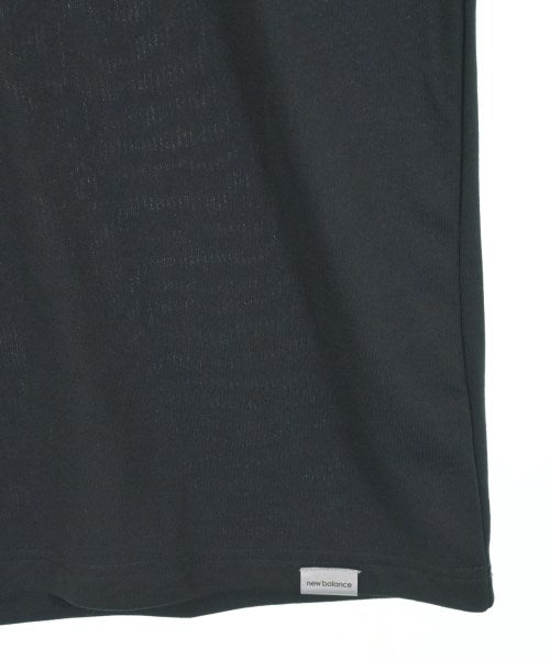 New Balance เสื้อยืด/เสื้อท็อปส์