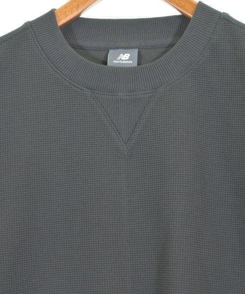 New Balance เสื้อยืด/เสื้อท็อปส์
