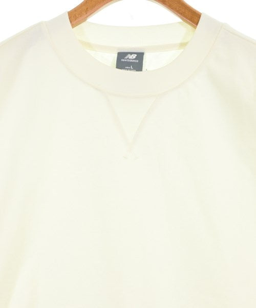 New Balance เสื้อยืด/เสื้อท็อปส์
