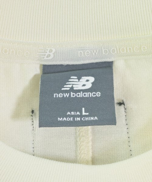 New Balance เสื้อยืด/เสื้อท็อปส์
