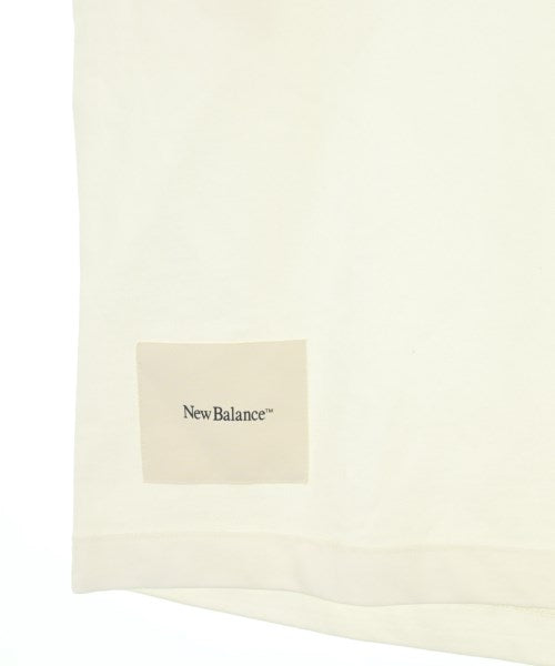 New Balance เสื้อยืด/เสื้อท็อปส์