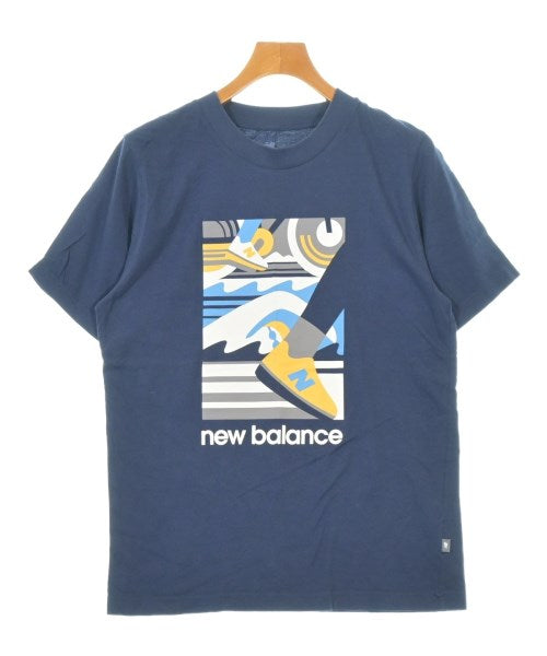 New Balance เสื้อยืด/เสื้อท็อปส์