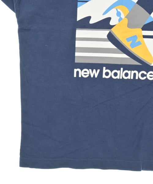 New Balance เสื้อยืด/เสื้อท็อปส์
