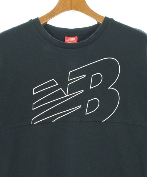 New Balance เสื้อยืด/เสื้อท็อปส์