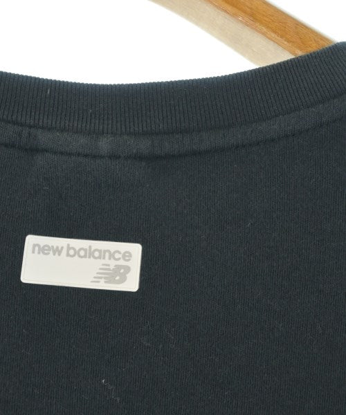 New Balance เสื้อยืด/เสื้อท็อปส์