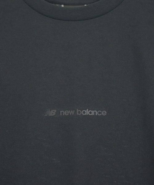 New Balance เสื้อยืด/เสื้อท็อปส์