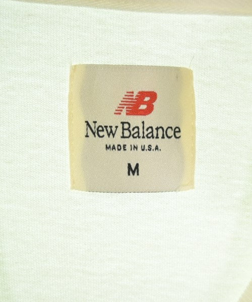 New Balance เสื้อยืด/เสื้อท็อปส์
