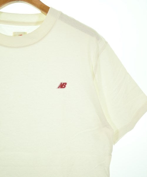 New Balance เสื้อยืด/เสื้อท็อปส์