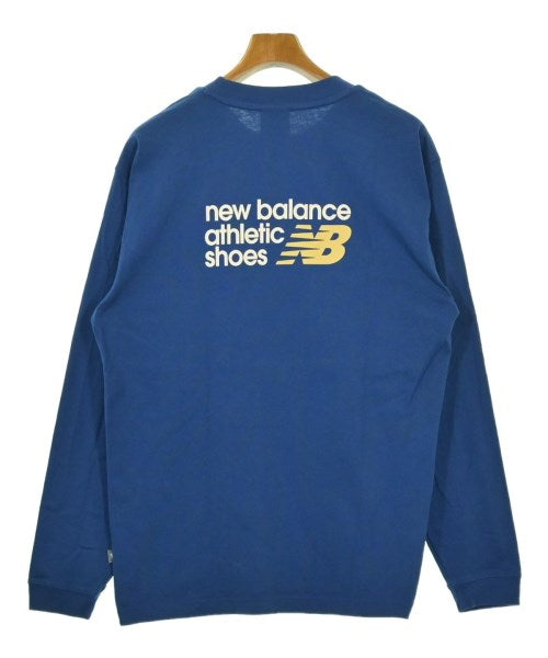 New Balance เสื้อยืด/เสื้อท็อปส์