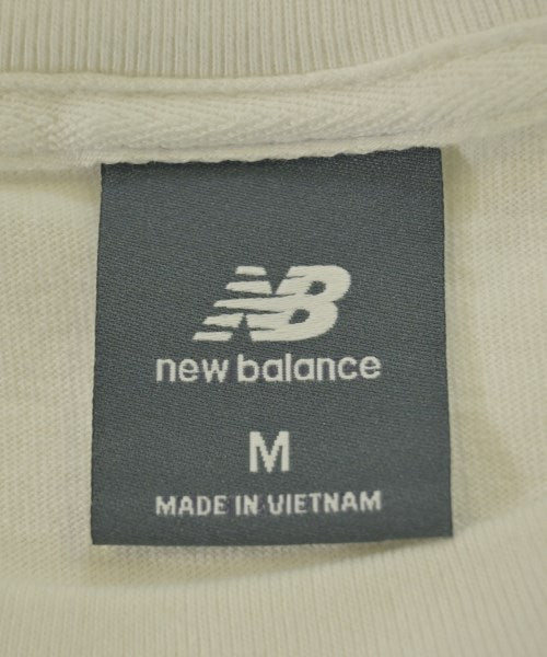 New Balance เสื้อยืด/เสื้อท็อปส์