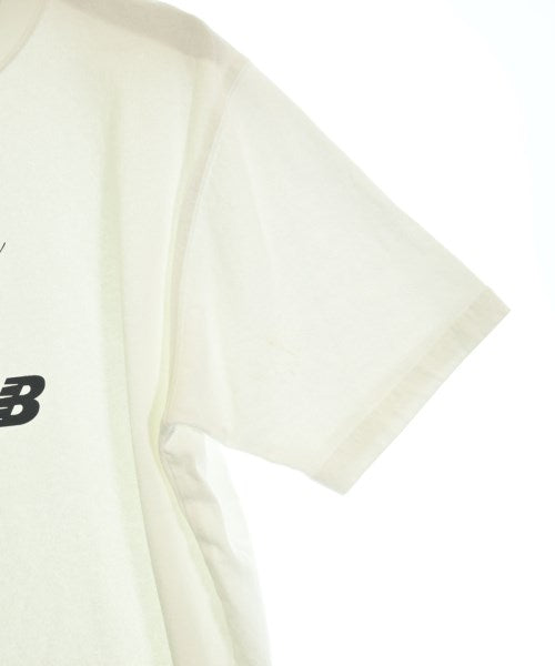 New Balance เสื้อยืด/เสื้อท็อปส์