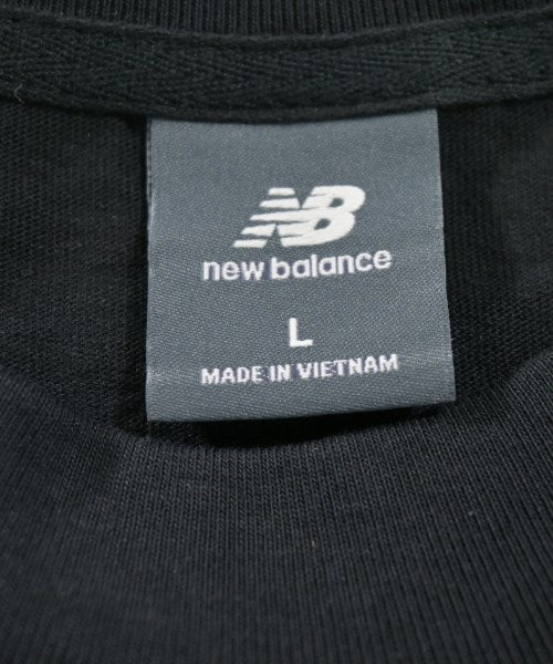 New Balance เสื้อยืด/เสื้อท็อปส์