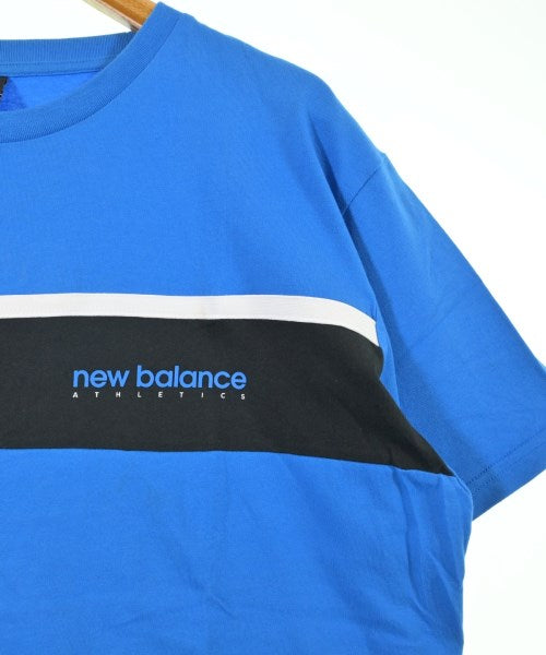 New Balance เสื้อยืด/เสื้อท็อปส์