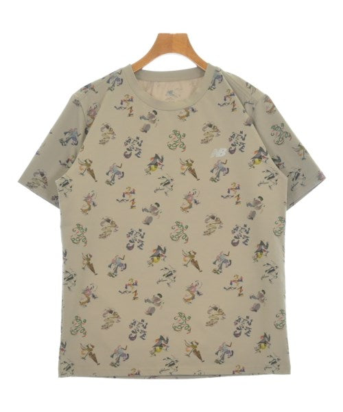 New Balance เสื้อยืด/เสื้อท็อปส์