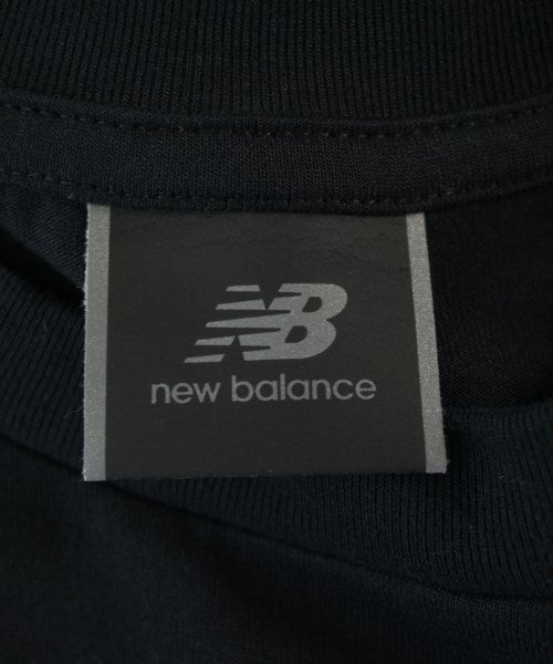 New Balance เสื้อยืด/เสื้อท็อปส์
