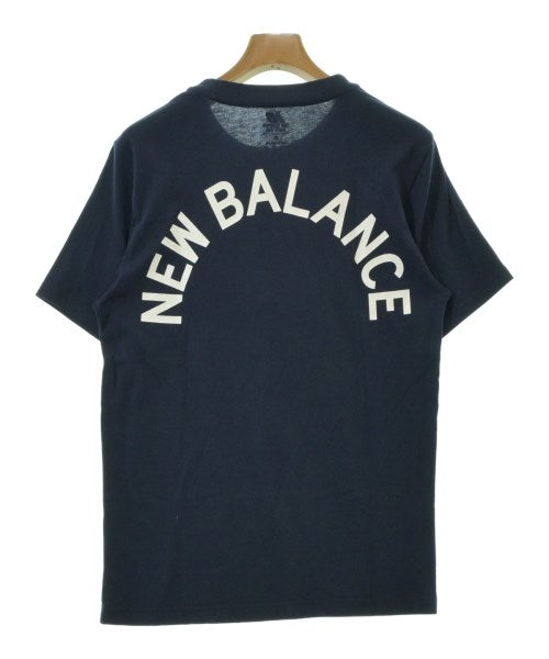 New Balance เสื้อยืด/เสื้อท็อปส์