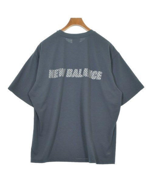New Balance เสื้อยืด/เสื้อท็อปส์