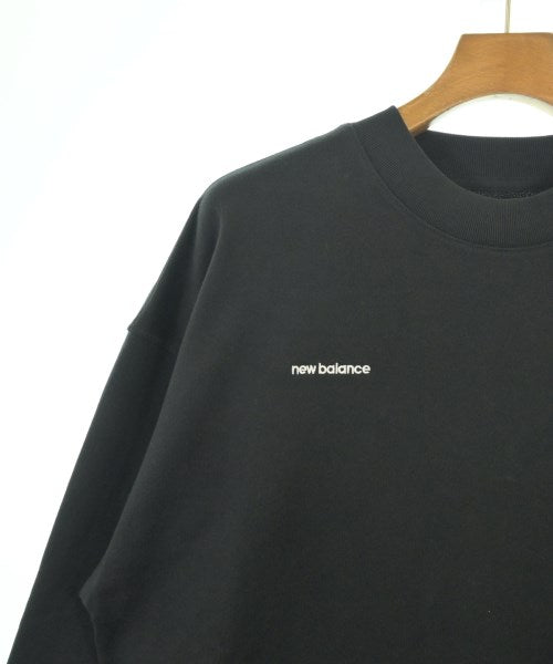 New Balance เสื้อยืด/เสื้อท็อปส์