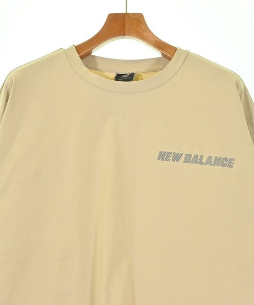 New Balance เสื้อยืด/เสื้อท็อปส์