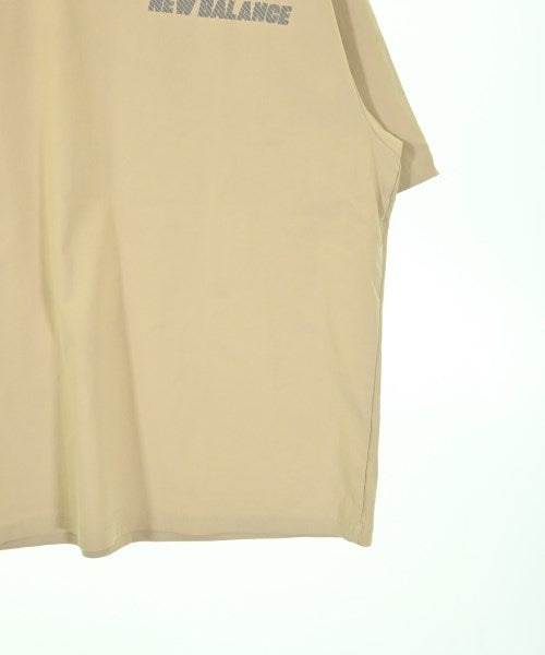 New Balance เสื้อยืด/เสื้อท็อปส์