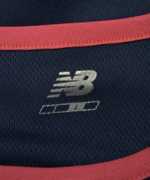 New Balance เสื้อยืด/เสื้อท็อปส์