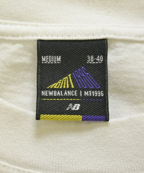 New Balance เสื้อยืด/เสื้อท็อปส์