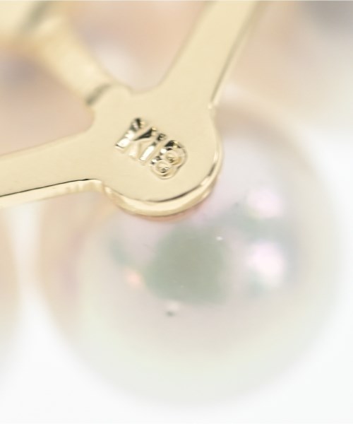 MIKIMOTO เครื่องประดับบนกระเป๋า