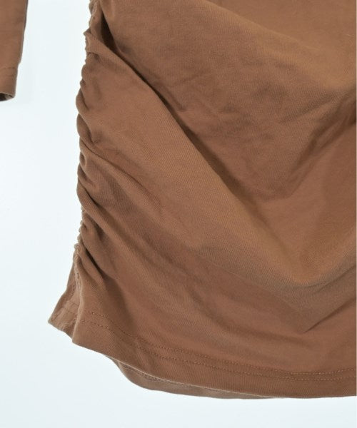 TNA เสื้อยืด/เสื้อท็อปส์