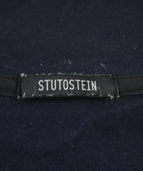 Stutostein เสื้อยืด/เสื้อท็อปส์