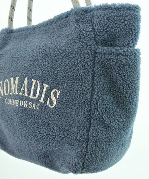NOMADIS กระเป๋าถือ