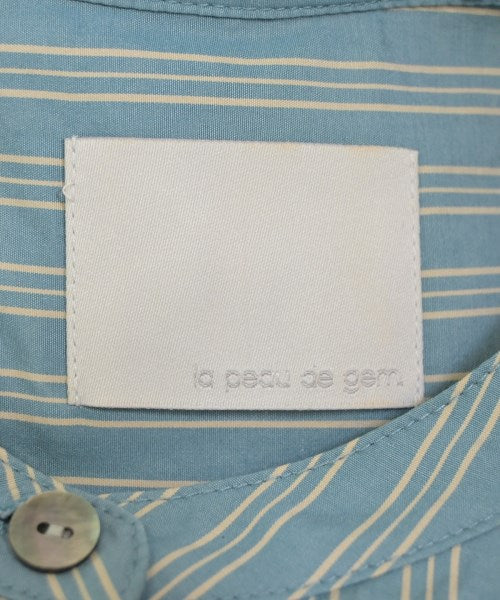 la peau de gem เดรสที่เป็นเสื้อเชิ้ตตัวยาว