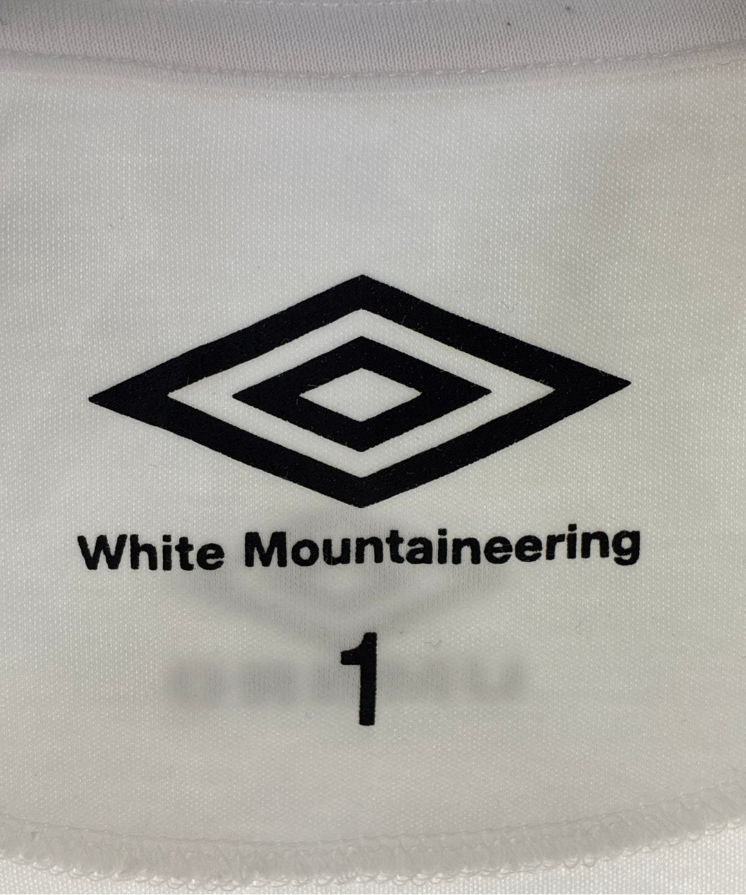 White Mountaineering เสื้อยืด/เสื้อท็อปส์