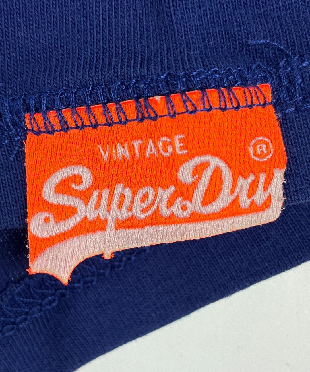 Superdry เสื้อยืด/เสื้อท็อปส์