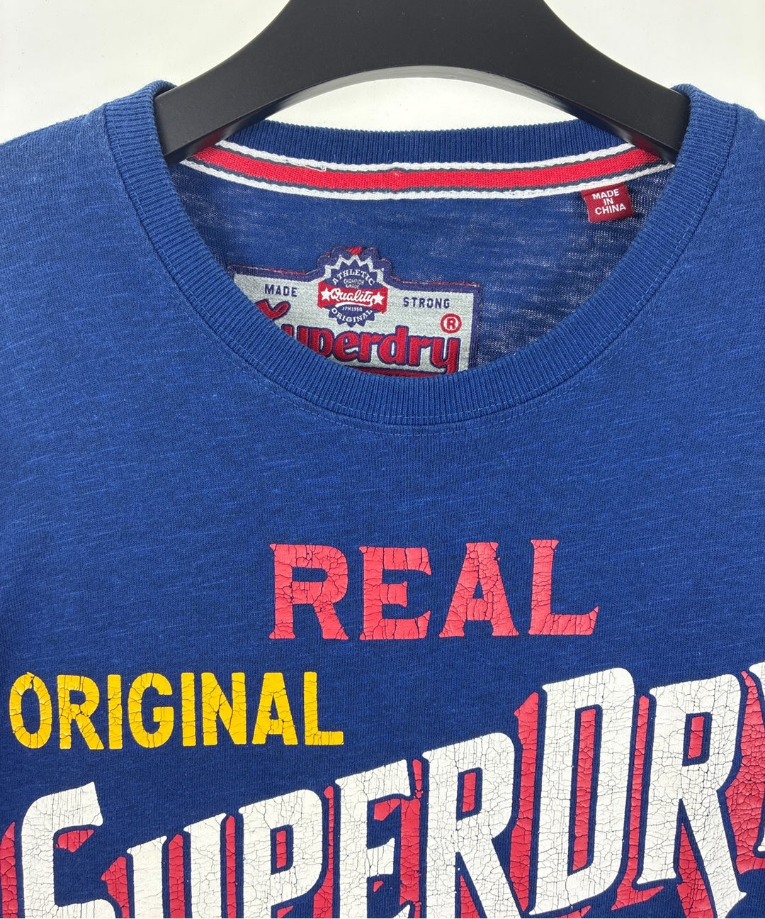 Superdry เสื้อยืด/เสื้อท็อปส์