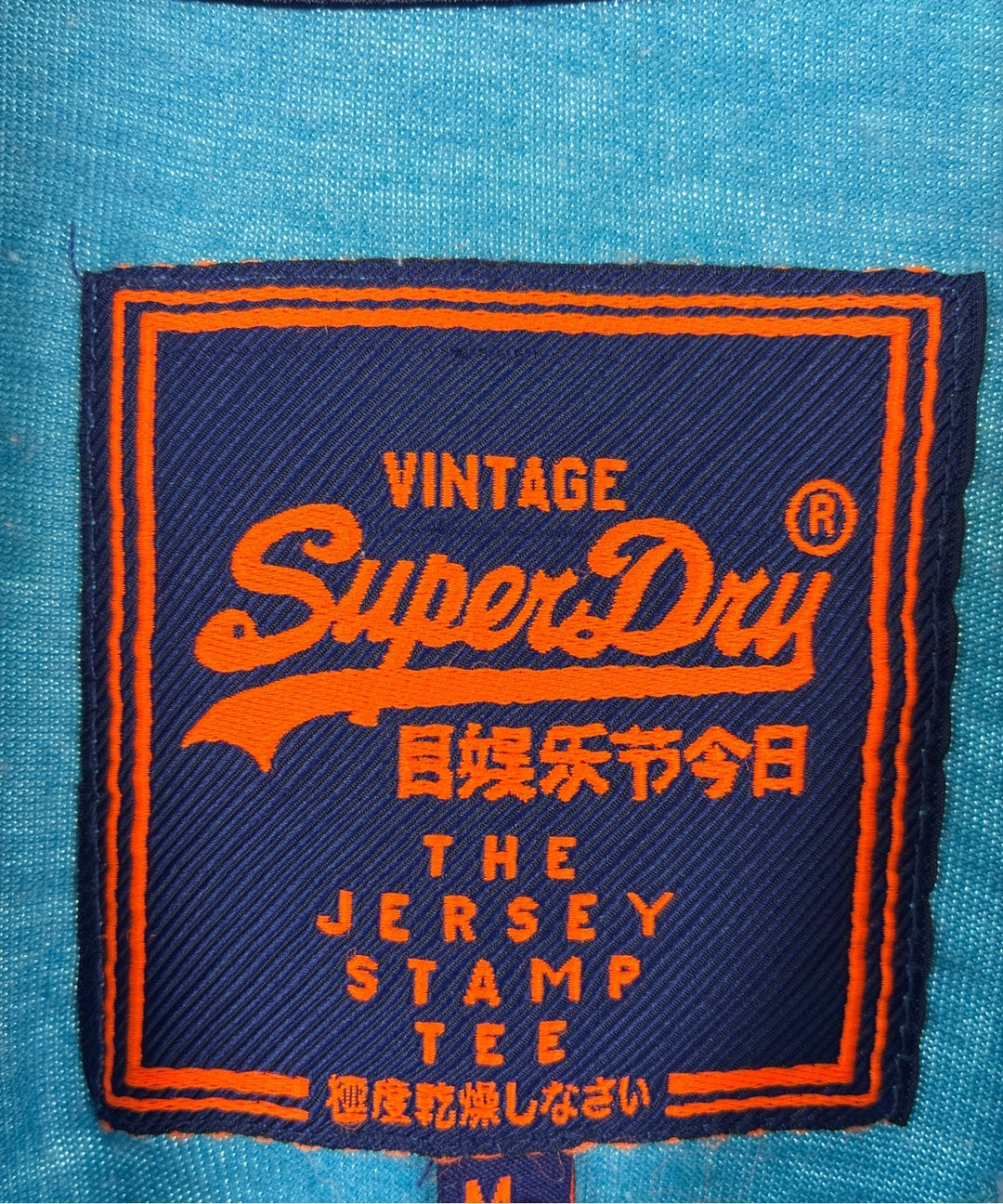 Superdry เสื้อยืด/เสื้อท็อปส์
