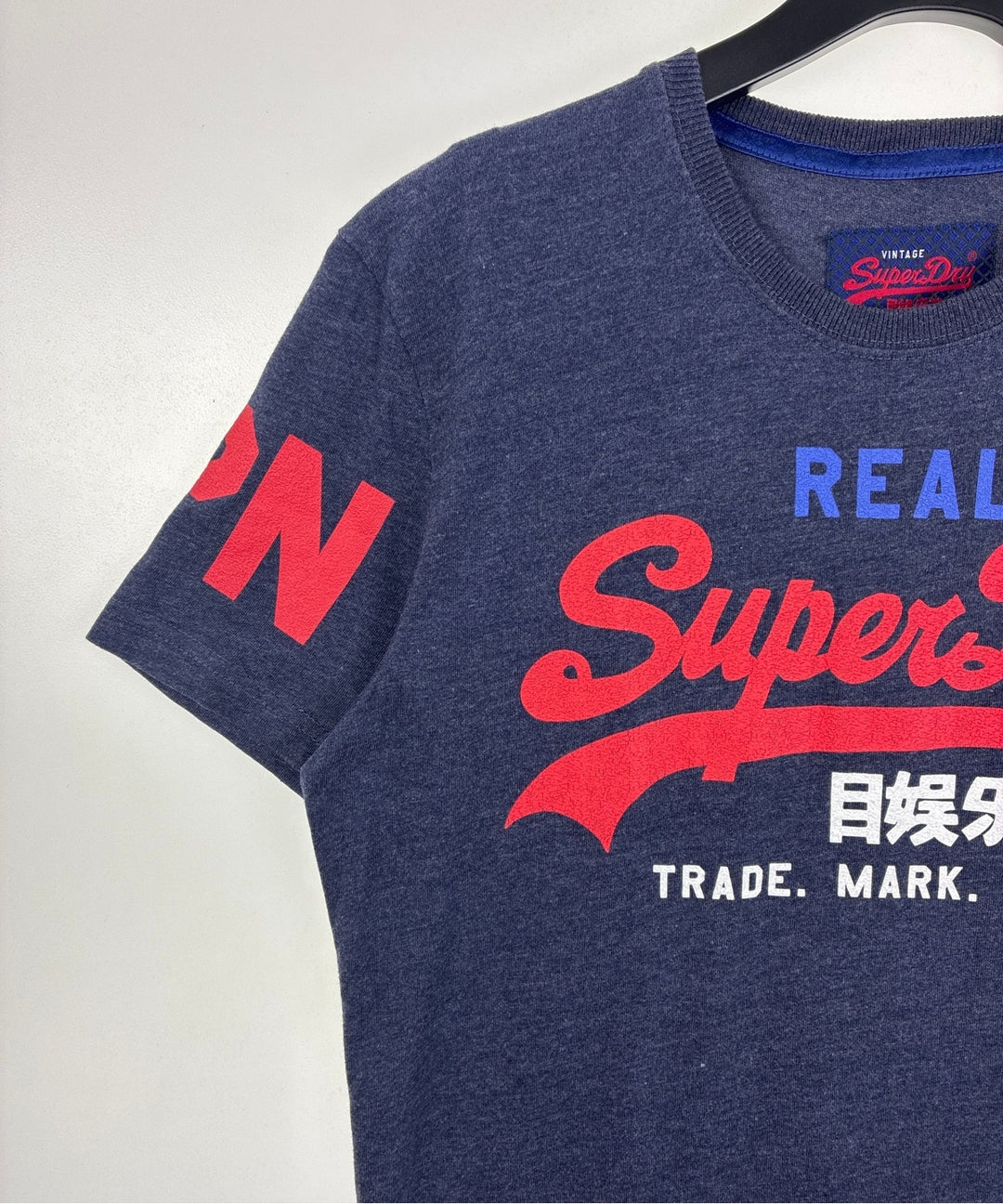 Superdry เสื้อยืด/เสื้อท็อปส์