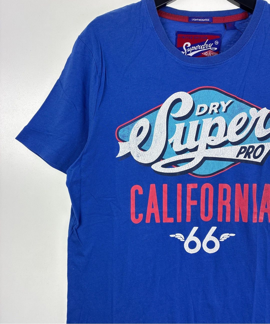 Superdry เสื้อยืด/เสื้อท็อปส์