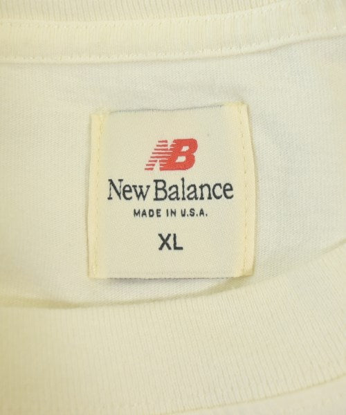 New Balance เสื้อยืด/เสื้อท็อปส์