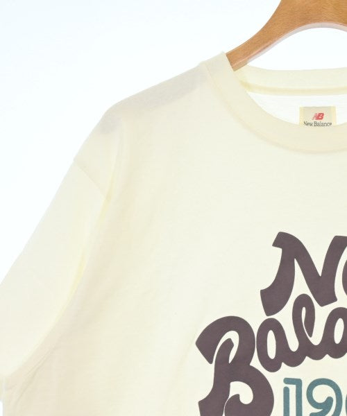New Balance เสื้อยืด/เสื้อท็อปส์