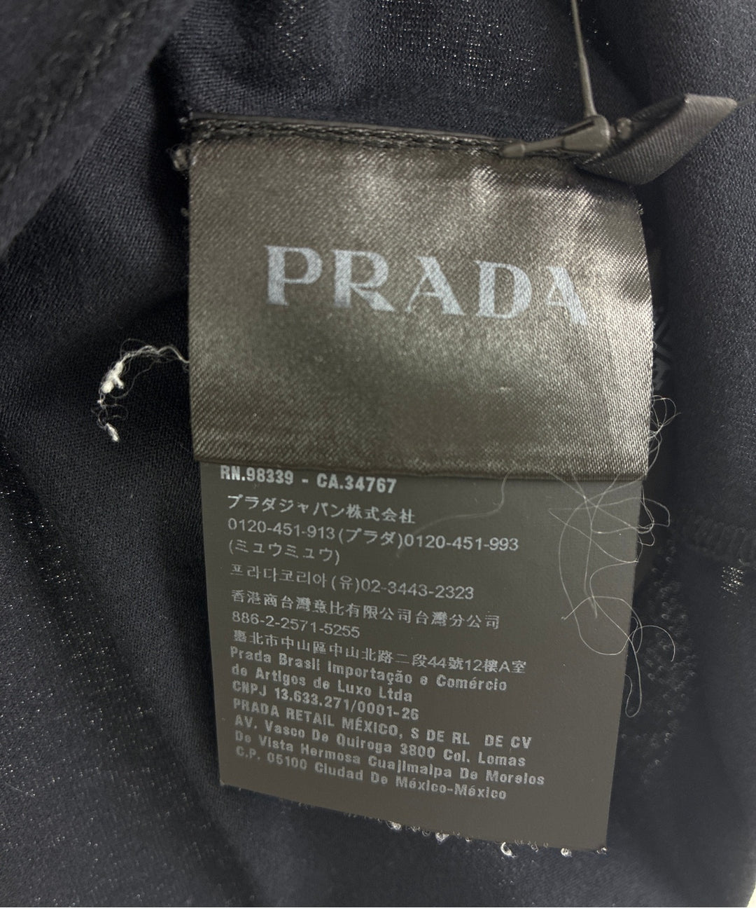 PRADA เสื้อยืด/เสื้อท็อปส์