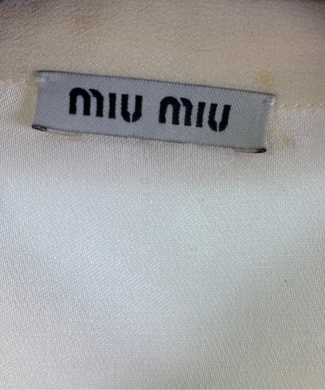 Miu Miu เสื้อลำลอง