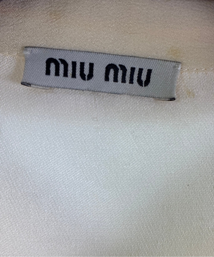Miu Miu เสื้อลำลอง