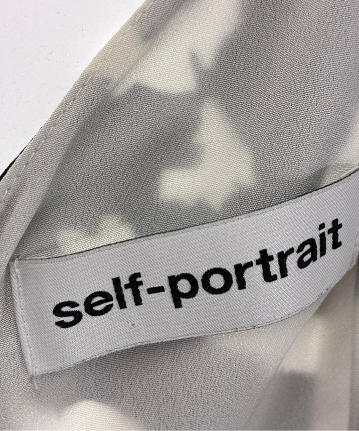 self-portrait แขนกุด