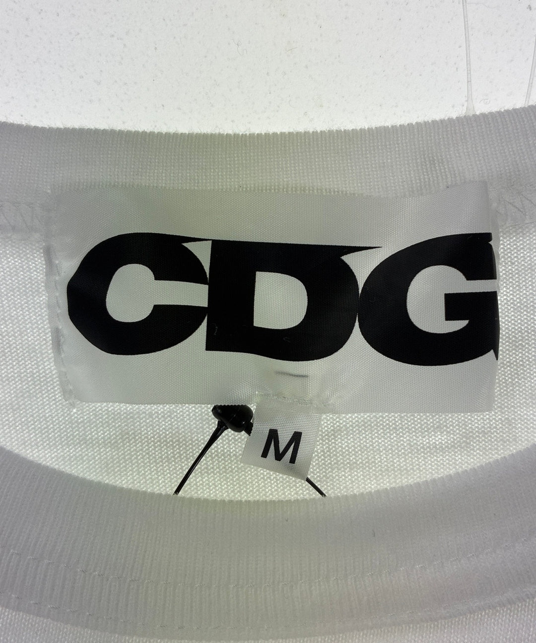 CDG เสื้อยืด/เสื้อท็อปส์