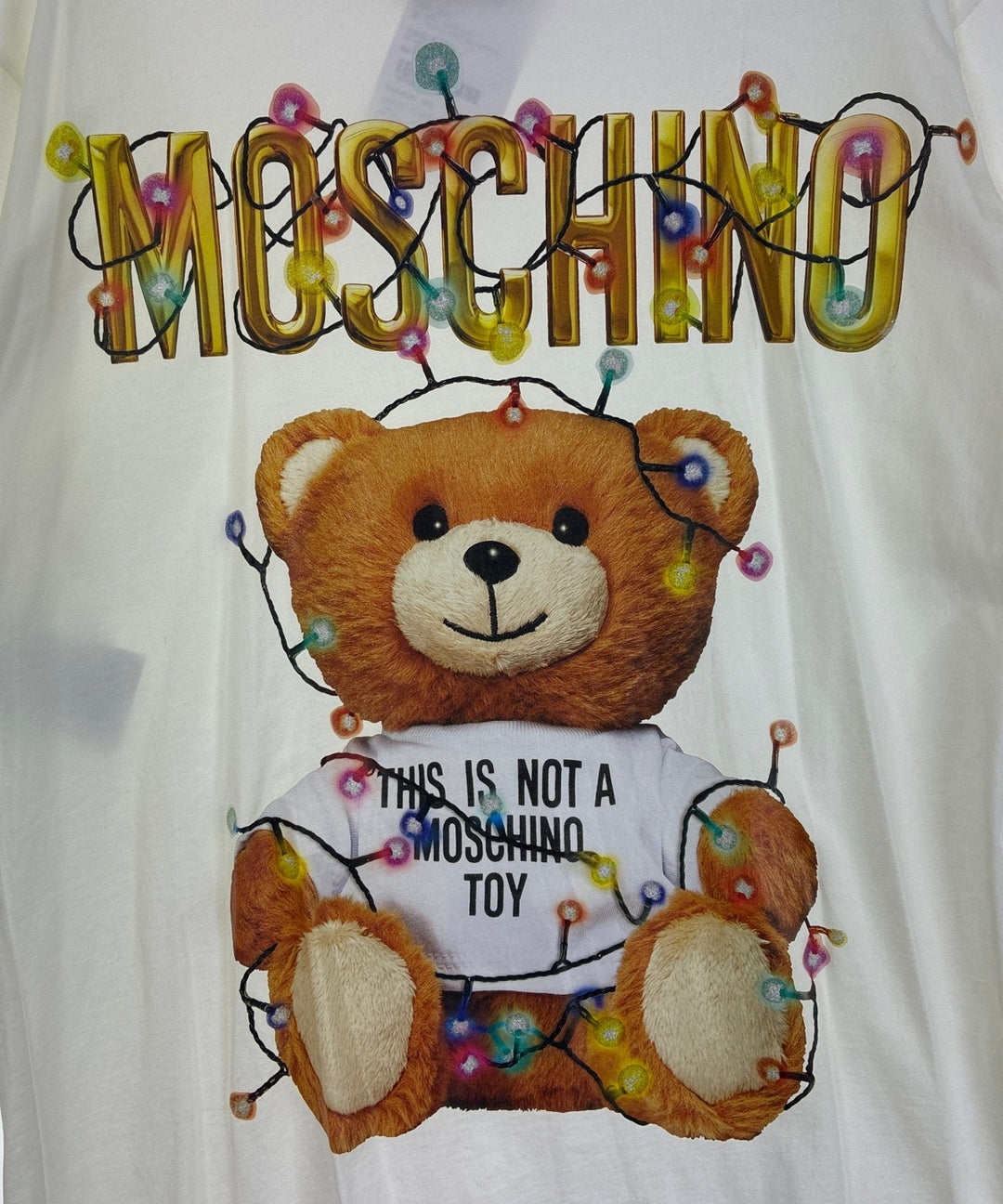 MOSCHINO เสื้อยืด/เสื้อท็อปส์