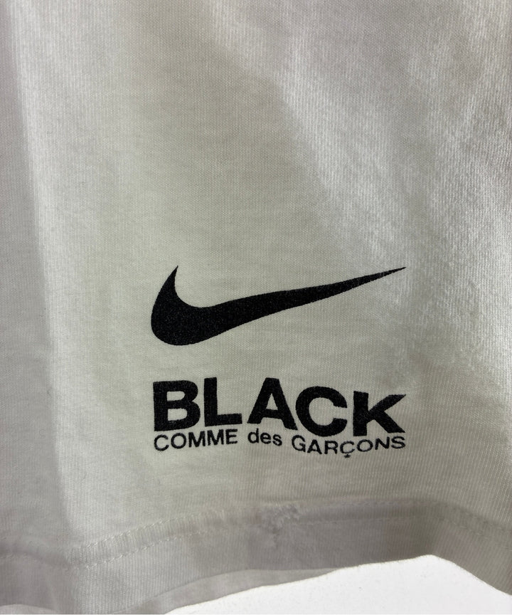 BLACK COMME des GARCONS เสื้อยืด/เสื้อท็อปส์