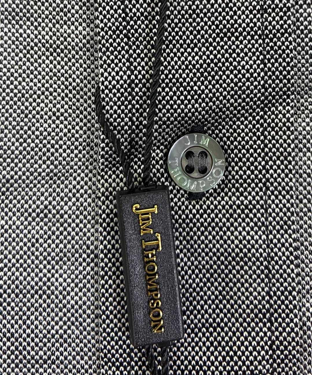 Jim Thompson เสื้อโปโล