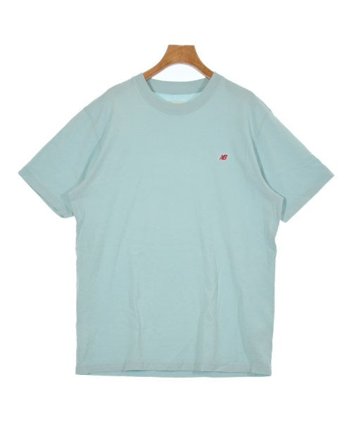 New Balance เสื้อยืด/เสื้อท็อปส์