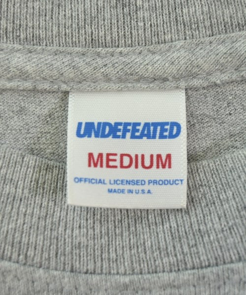 UNDEFEATED เสื้อยืด/เสื้อท็อปส์