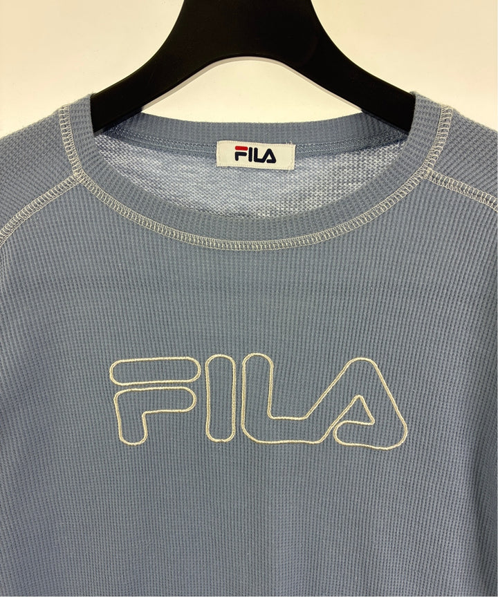 FILA เสื้อยืด/เสื้อท็อปส์